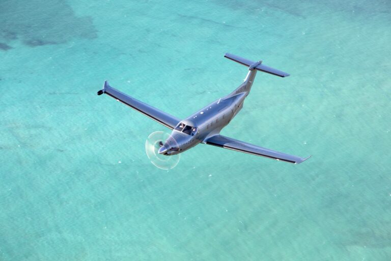 Tradewinds plane flying over water